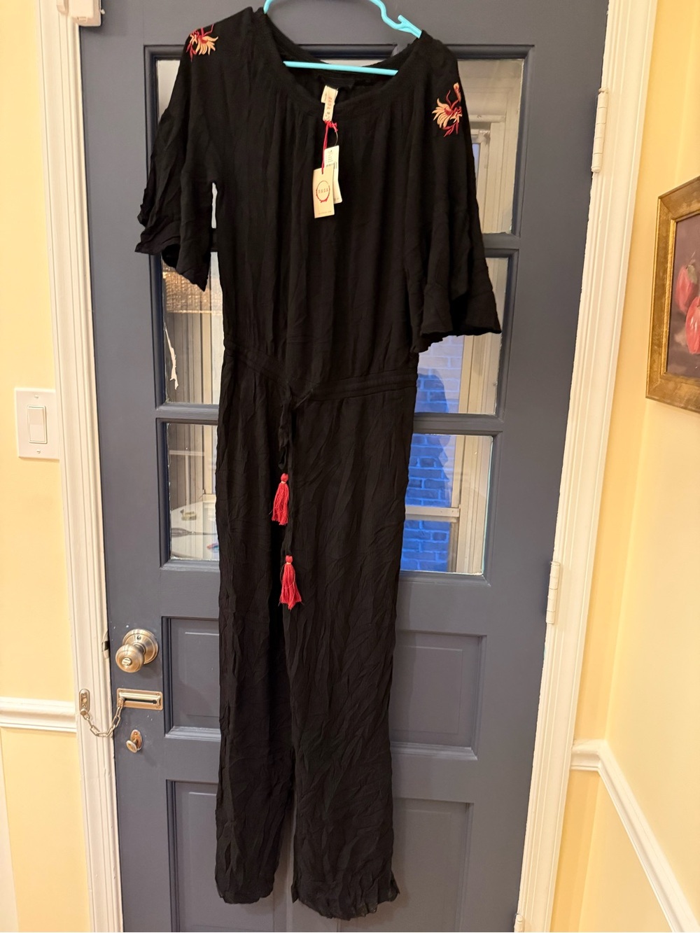 Anthropologie RAGA Black Jumpsuit with Red tassel Detail
